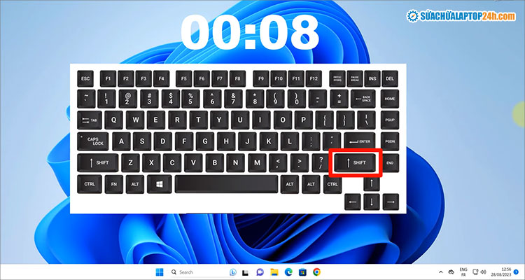 Nhấn giữ phím Shift bên phải như hình trong 8s để khóa bàn phím laptop tạm thời